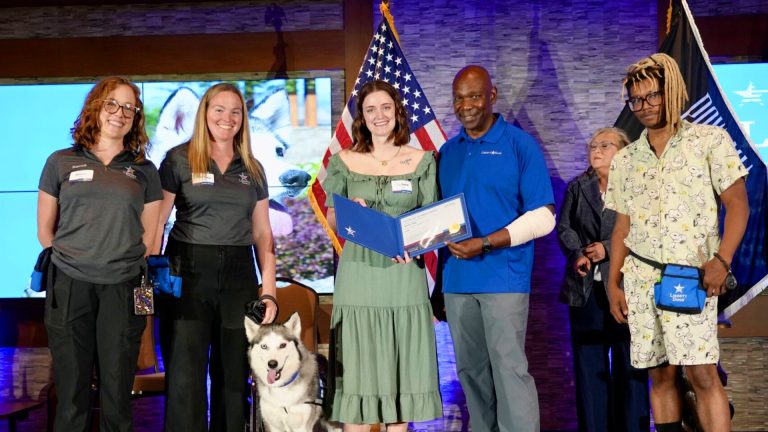 Liberty Dogs CEO, Ondra Berry, with Foster, Sydnee Biagi, and Veteran, Christian McDuffie matching with shelter dog Lady